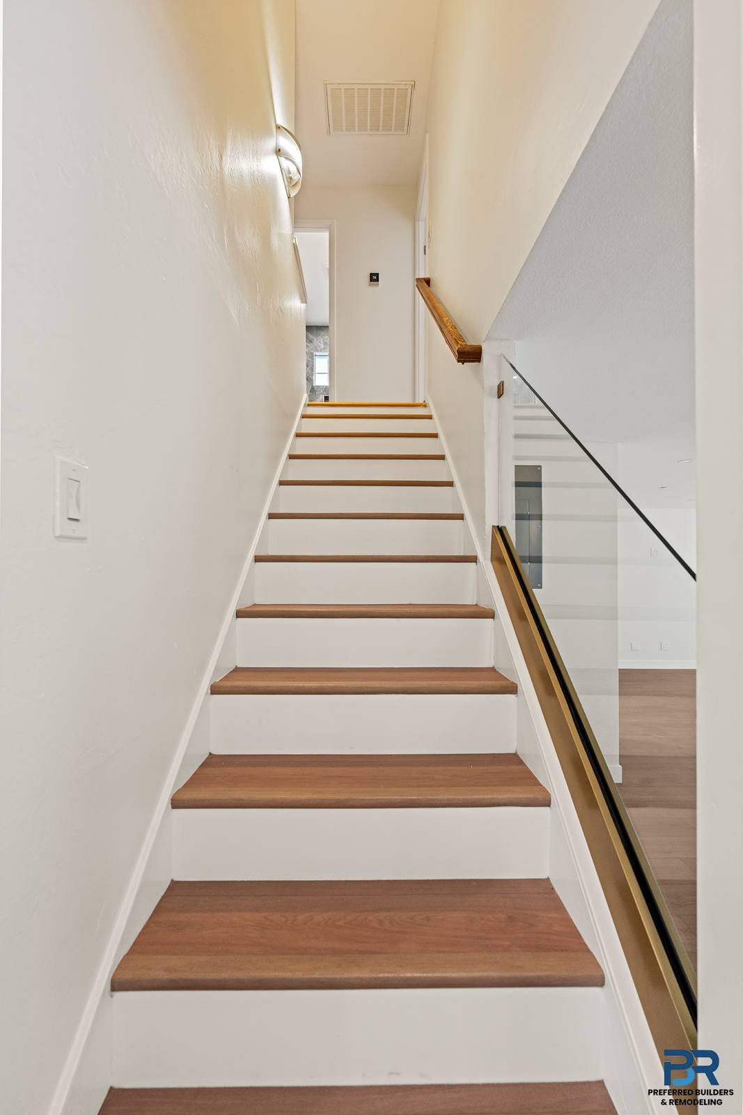 Remodeled staircase with wood treads in a San Jose home