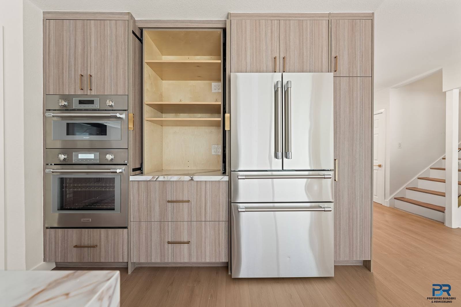 Built-in ovens and refrigerator in a remodeled San Jose kitchen