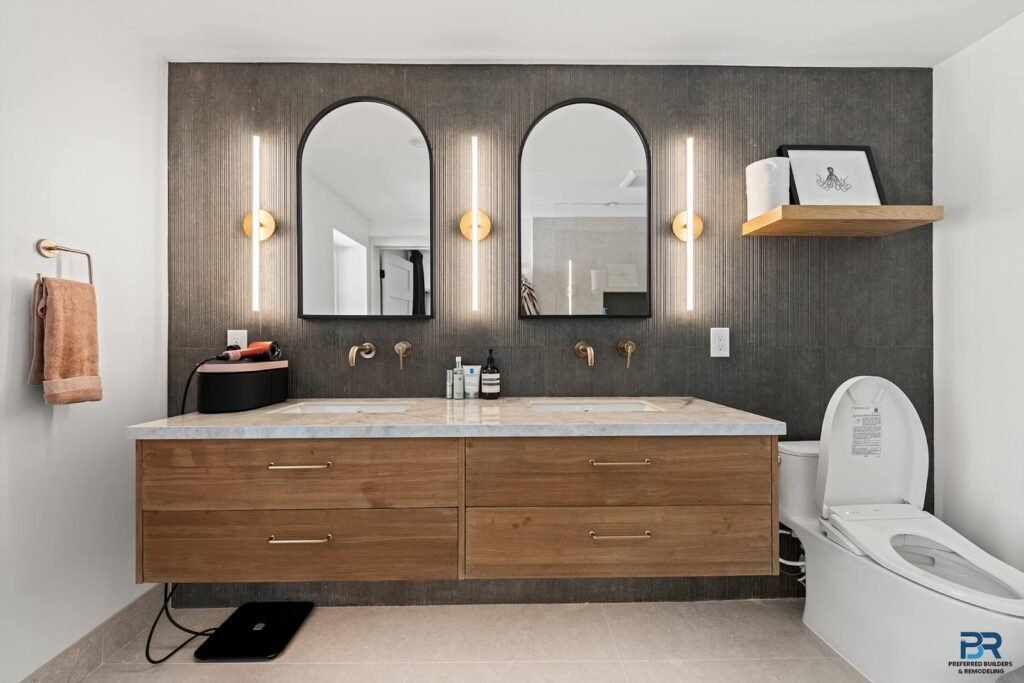 Bathroom update ideas: floating wood double vanity with two arched mirrors in a San Carlos remodel