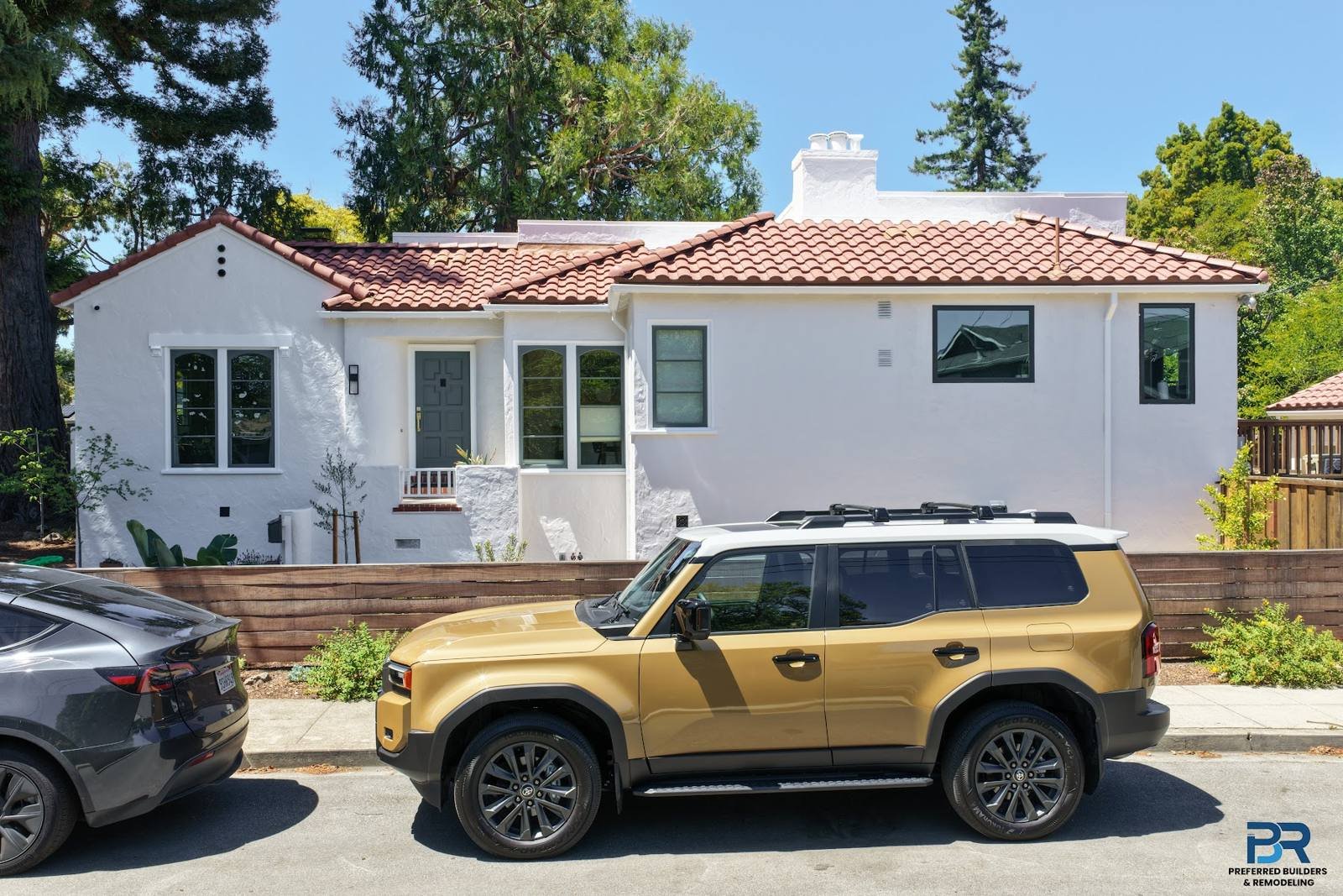 Front of a remodeled home with a red tile roof in a San Carlos whole-house remodel